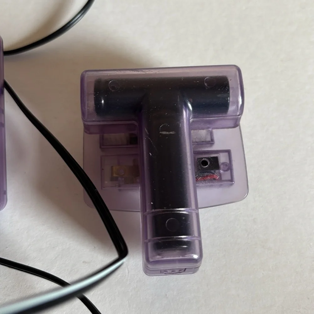 AC/DC power adapter and 2 battery packs for Nintendo Game Boy Color